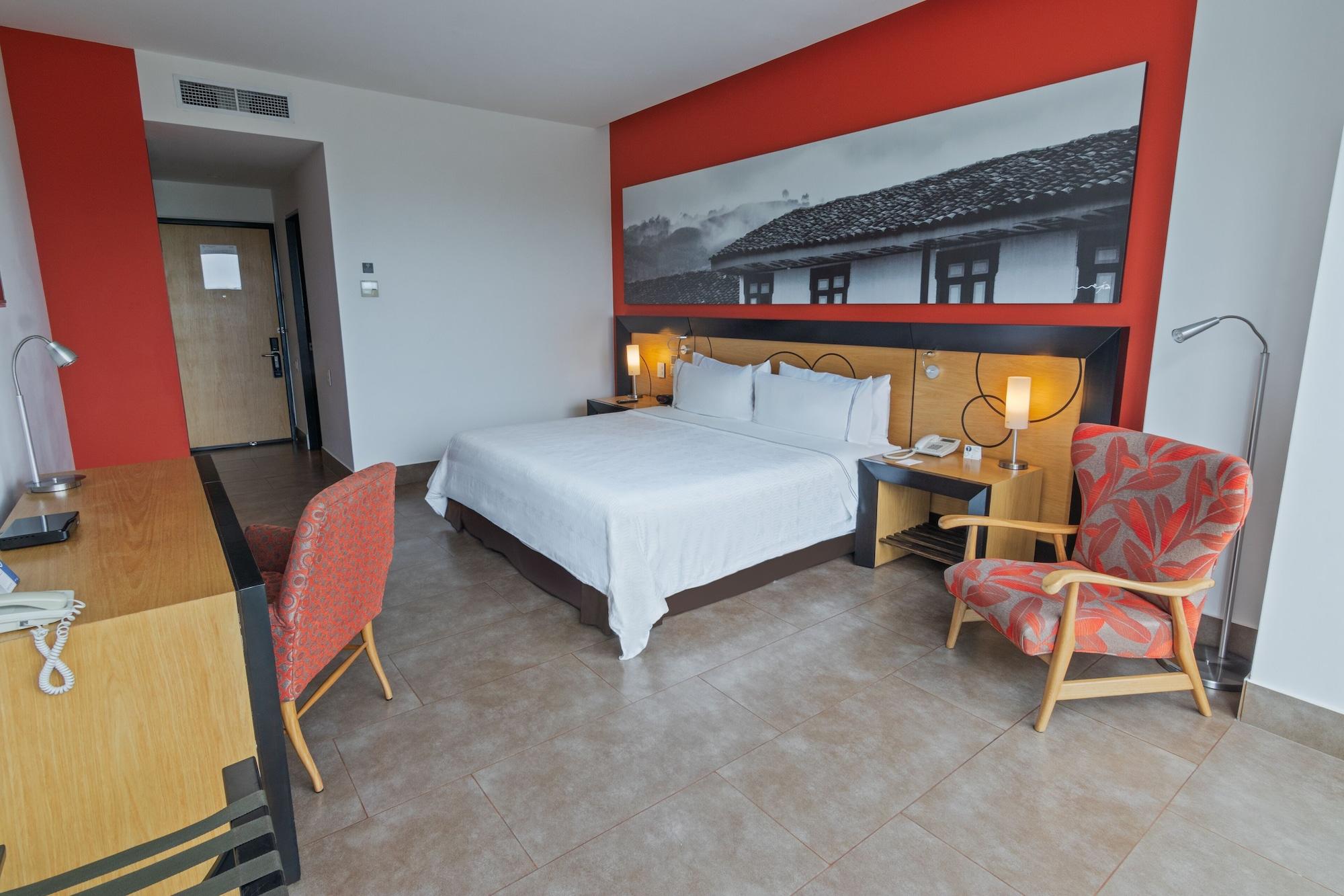 Sonesta Hotel Pereira Cerritos Exterior photo A room at the hotel
